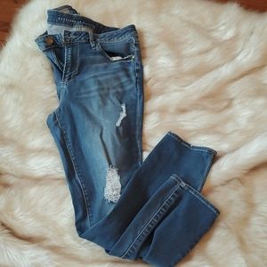 Size 30, stretch distressed skinny leg denim